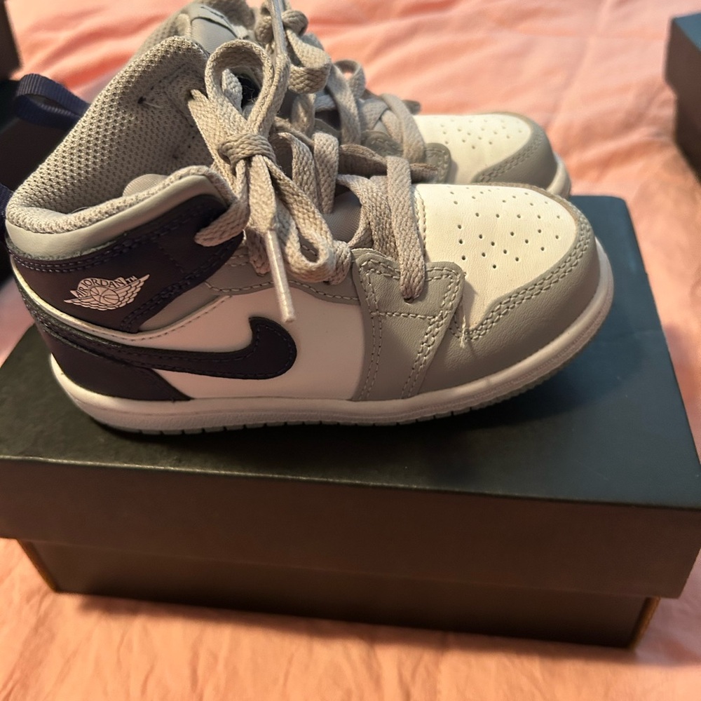 Jordan Gray and White Sneakers Classic High-Top Design